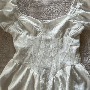 Women’s white zip up flowy dress. Great condition. Never used.